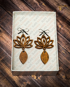 Layered wooden lotus flower earrings with silver bow stud tops displayed in a premium white Slate & Ember jewelry gift box.